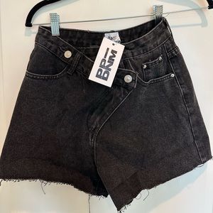 Black asymmetrical denim shorts size US 2 Princess polly